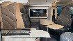 buesgen-wohnraumdesign_silver-line_klappen_der_oberschraenke_in_mit_silbernen_profilleisten_tisch-dde8a843-7ebe-4a3b-8abd-43251bcab32c